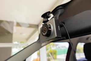 Car CCTV camera video recorder for driving safety on the road photo
