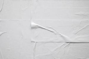 white crumpled and creased paper poster texture background photo