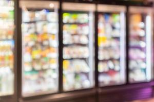 supermarket grocery store shelves blurred background photo