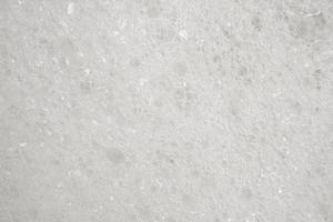 Abstract white soap foam texture background close up photo