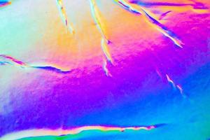 Crumpled Holographic rainbow foil iridescent texture abstract hologram background photo