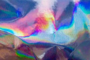 fondo de holograma abstracto de textura iridiscente de hoja de arco iris holográfica foto
