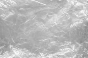 transparent plastic bag texture on white background photo