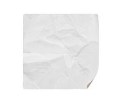 Blank white square paper sticker label isolated on white background photo