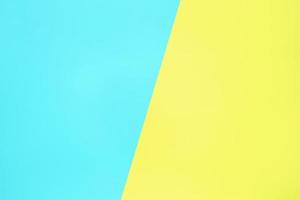 vista superior de textura de papel de color pastel azul y amarillo fondo plano mínimo foto