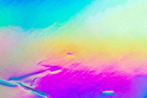 Crumpled Holographic rainbow foil iridescent texture abstract hologram background photo