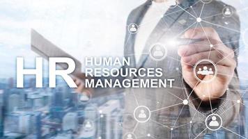 concepto de gestión de recursos humanos, recursos humanos, formación de equipos y contratación en el fondo borroso. foto