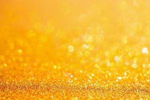 gold glitter sparkle with bokeh background photo