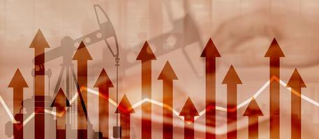 Rising prices for fuel resources. Up arrows on the background of oil rigs. photo