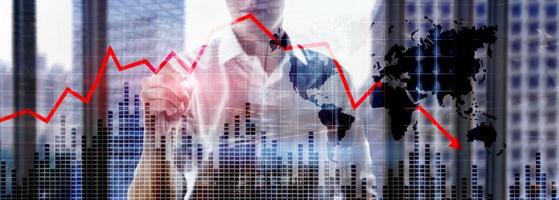 Chart with red down arrow on abstract background. Falling growth in business. photo