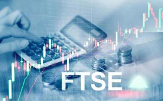 FTSE 100 Financial Times Stock Exchange Index United Kingdom UK England Investment Trading concept with chart and graphs. photo