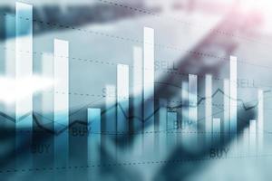 Sell and Buy. Financial stock trading graph chart diagram on blurred office background. photo