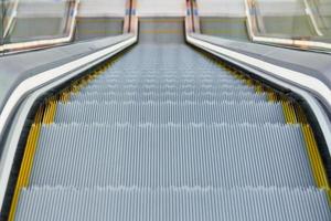 Escalator in shopping center photo