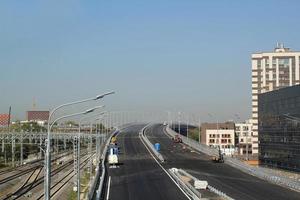 New traffic intersection road construction site. Development of Transport infrastructure junction, improvement highway. Overpopulation problem. Erection overpass of northeast chord in Moscow, Russia photo
