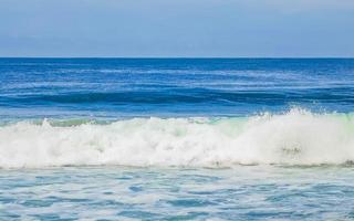 Extremely huge big surfer waves at beach Puerto Escondido Mexico. photo