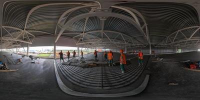 Tula, Russia, June 4, 2013 - Seamless full spherical 360 degree panorama in equirectangular projection of concrete floor filling process in industrial building photo