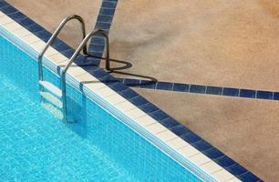 swimming pool with stair at hotel photo