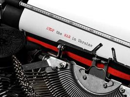 Stop the war in Ukraine. Typed on a vintage typewriter. photo