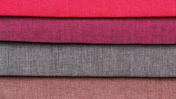 Colorful background, A stack of colorful fabric. Full frame shot of multi colored fabric background photo