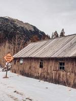 Road Sign and Mountains photo