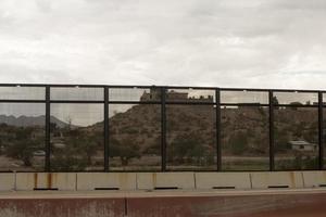 El Paso, Texas, USA September 29, 2022 Border Wall along the US Mexico Border near Downtown El Paso photo