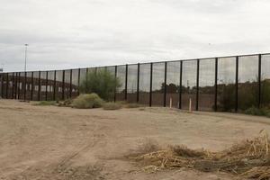 El Paso, Texas, USA September 29, 2022 Border Wall along the US Mexico Border near Downtown El Paso photo