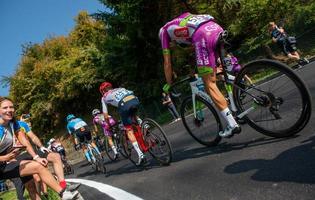 Italy 2022 Giro di Lombardia group cyclists engaged in the ascent of Dossena photo