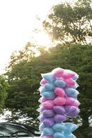 column of cotton candy, very sweet and colorful, mexican candy sold in the streets photo