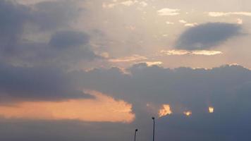 The beautiful sunset view with the colorful clouds and sky in the city photo