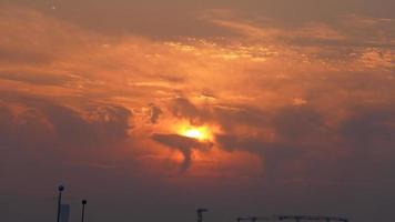 The beautiful sunset view with the colorful clouds and sky in the city photo