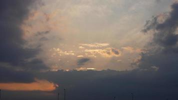 The beautiful sunset view with the colorful clouds and sky in the city photo