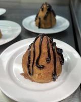 Cake anthill with chocolate cream photo