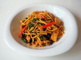 Stir-fried curry paste with bamboo shoot and pork in Thai style photo
