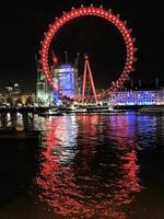 London in the UK in March 2018. A view of the London Eye at night photo