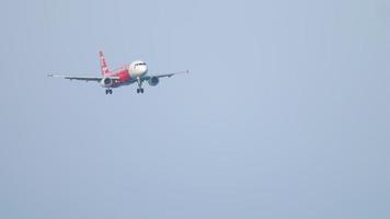 PHUKET, THAILAND DECEMBER 1, 2018 - Thai AirAsia Airbus 320 HS ABK approaching before landing, International Phuket Airport video