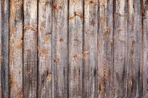Old wood texture. A dark grunge wooden planks background photo
