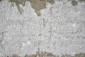 Gray concrete wall as background. Stone texture closeup photo