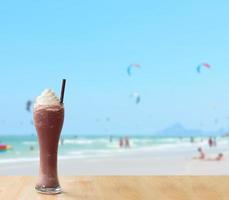 Ice cocoa on wooden table photo