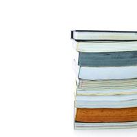 books stack isolated on white background photo