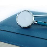 Stethoscope  on a notebook photo