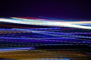 Abstract motion city night lighting. photo