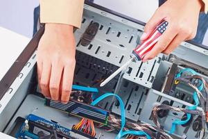 technician repairing electronic equipment photo