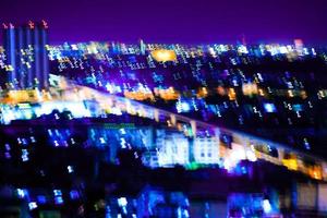 iluminación nocturna de la ciudad de movimiento abstracto. foto