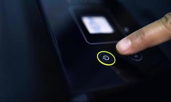 Concept of start, The power button glows green-yellow to start. photo