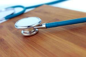 Stethoscope  on a wood background photo