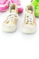 Kid shoes isolate on white photo