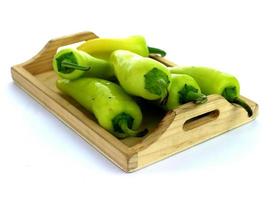 green sweet pepper isolated on a white background photo