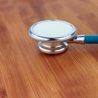 Stethoscope  on a wood background photo