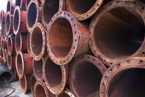 A texture industrial background of Rusty iron pipes  stack photo