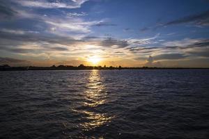 Beautiful Landscape View of Beach Dramatic Colorful Sunset photo